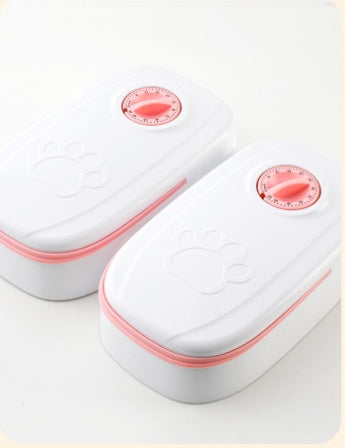 Distributeur automatique de nourriture pour animaux de compagnie.