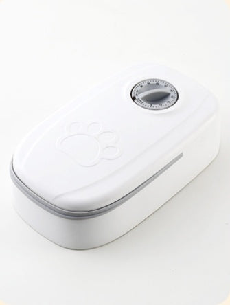 Distributeur automatique de nourriture pour animaux de compagnie.